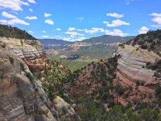 view from the top looking down the canyon between two bluffs